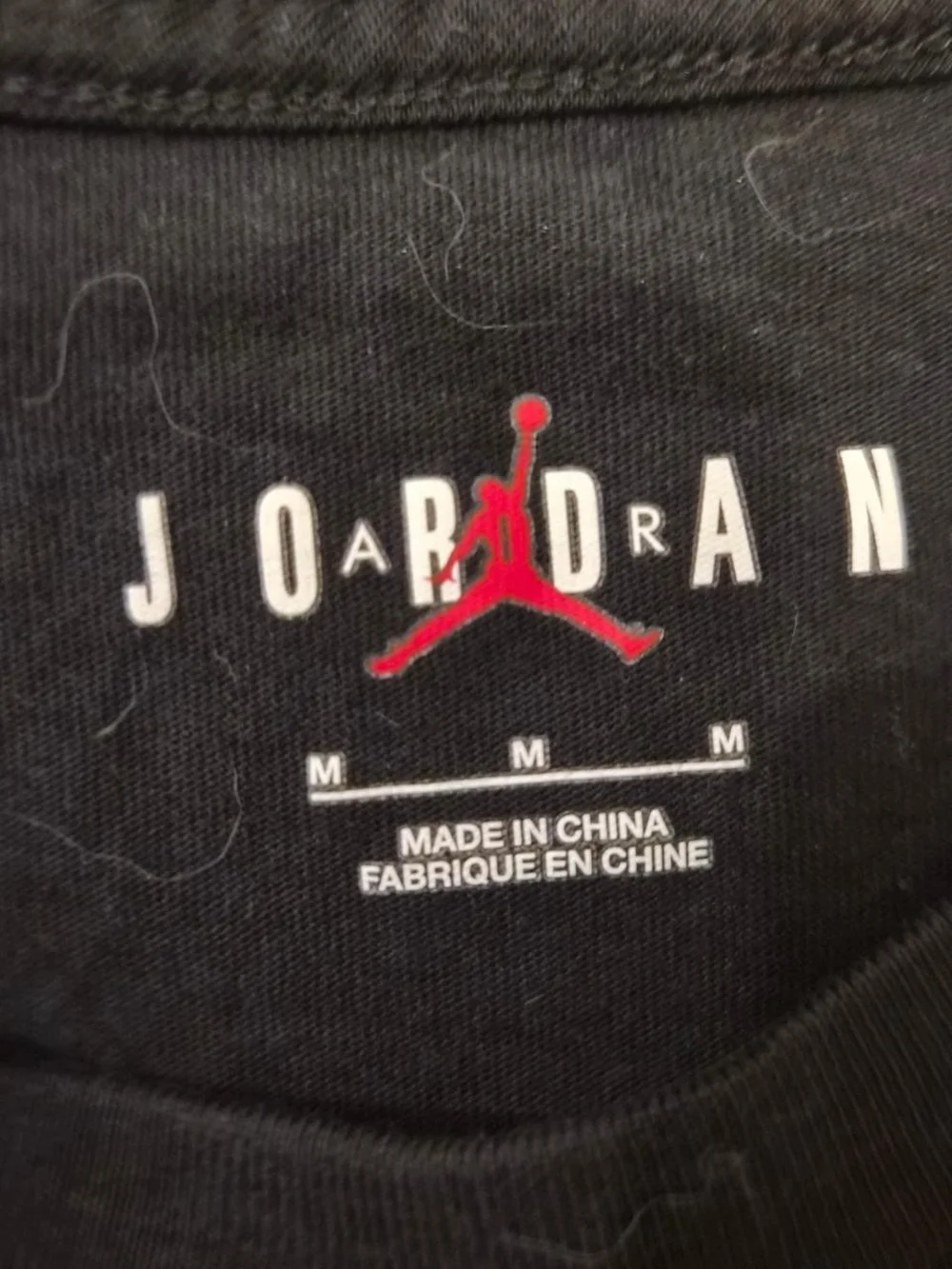 Jordan Black Short Sleeve Tee with White 'World of Flight' Graphic